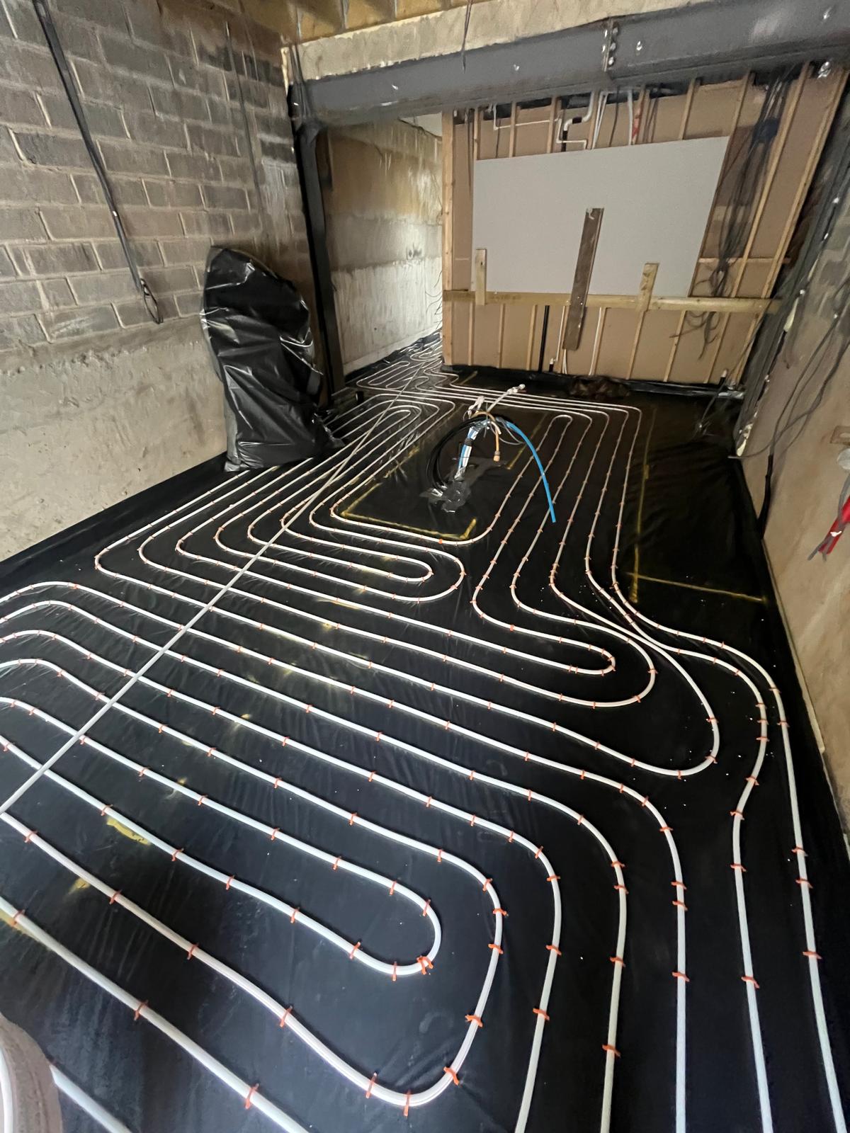 Clifton retrofit — UFH pipe installation